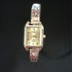 Reloj oro laminado